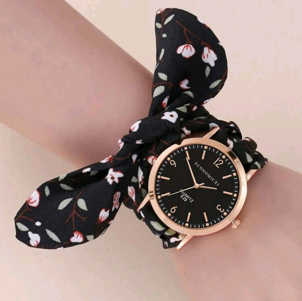 Black floral wristband watch